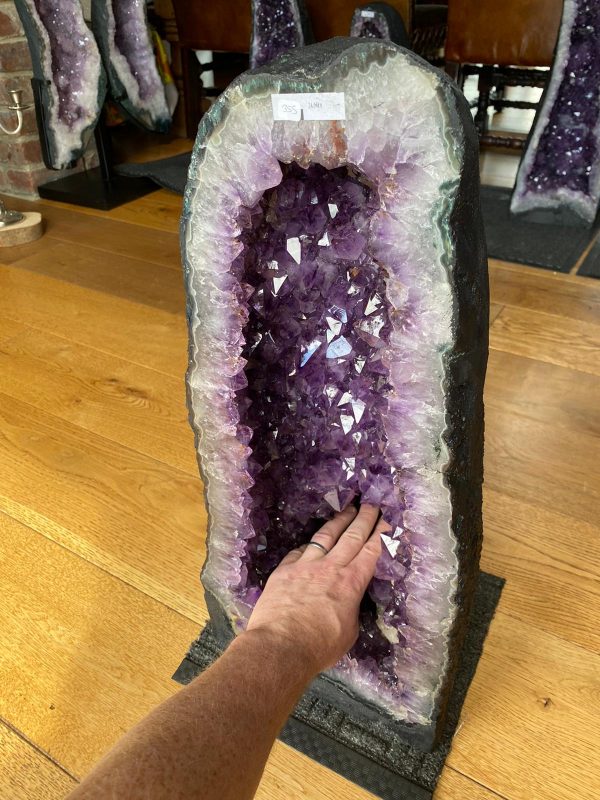 Tall Amethyst Geode on a table